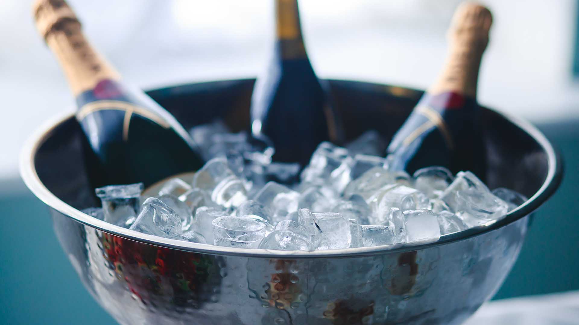 Bottles of champagne in a tub of ice