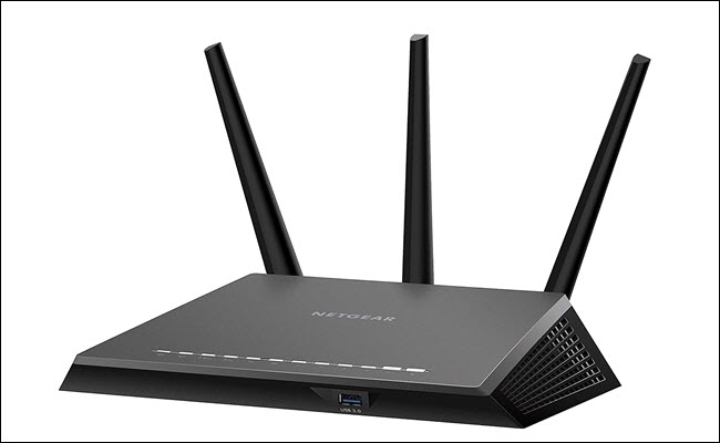 A Netgear Nighthawk R7000P with all three antennas up.