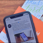 Twitter-Bookmarks-screen-show-on-iPhone-on-top-of-books-and-bookmarks