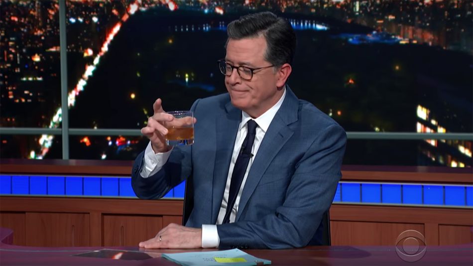 Stephen Colbert performs an eerie no-audience monologue while sipping whisky