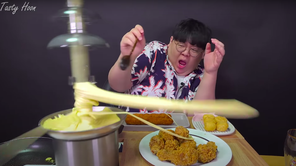 YouTuber attacked by flying cheese fondue in spectacular viral video