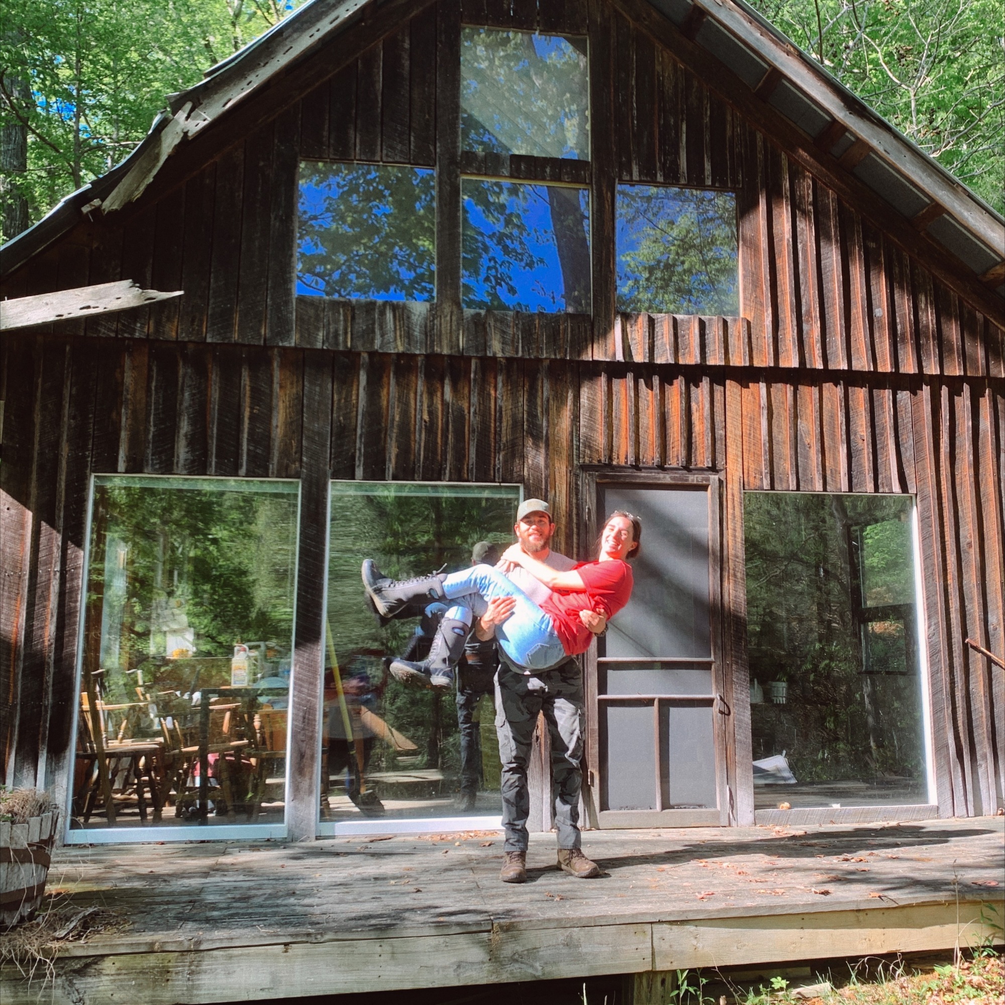 The Curtin's outside of their off the grid home in Kentucky.