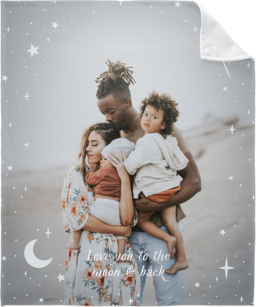 fleece photo blanket of family hugging on beach