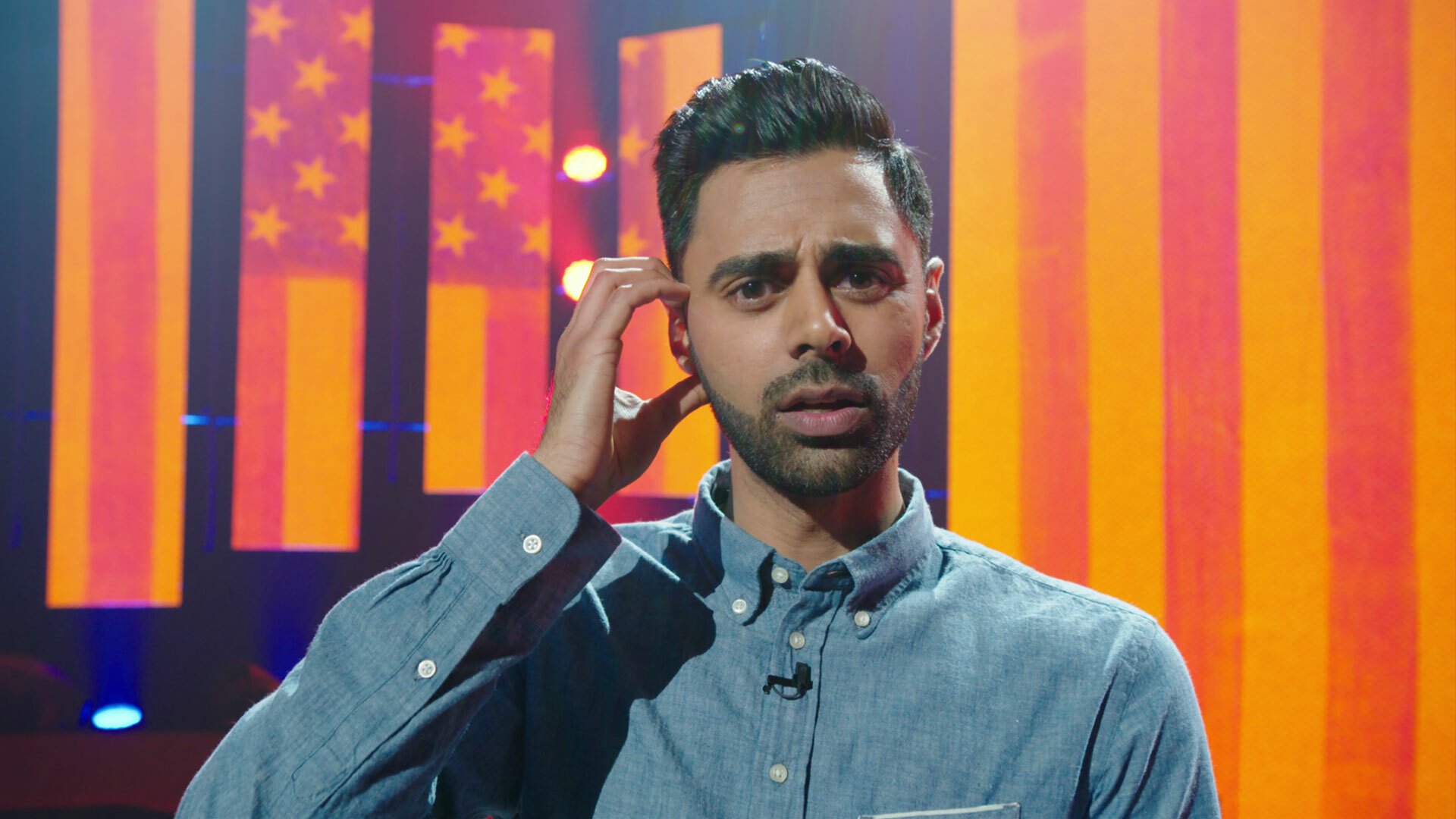 A close-up of Hasan Minhaj in his Netflix special, "Hasan Minhaj: Homecoming King."