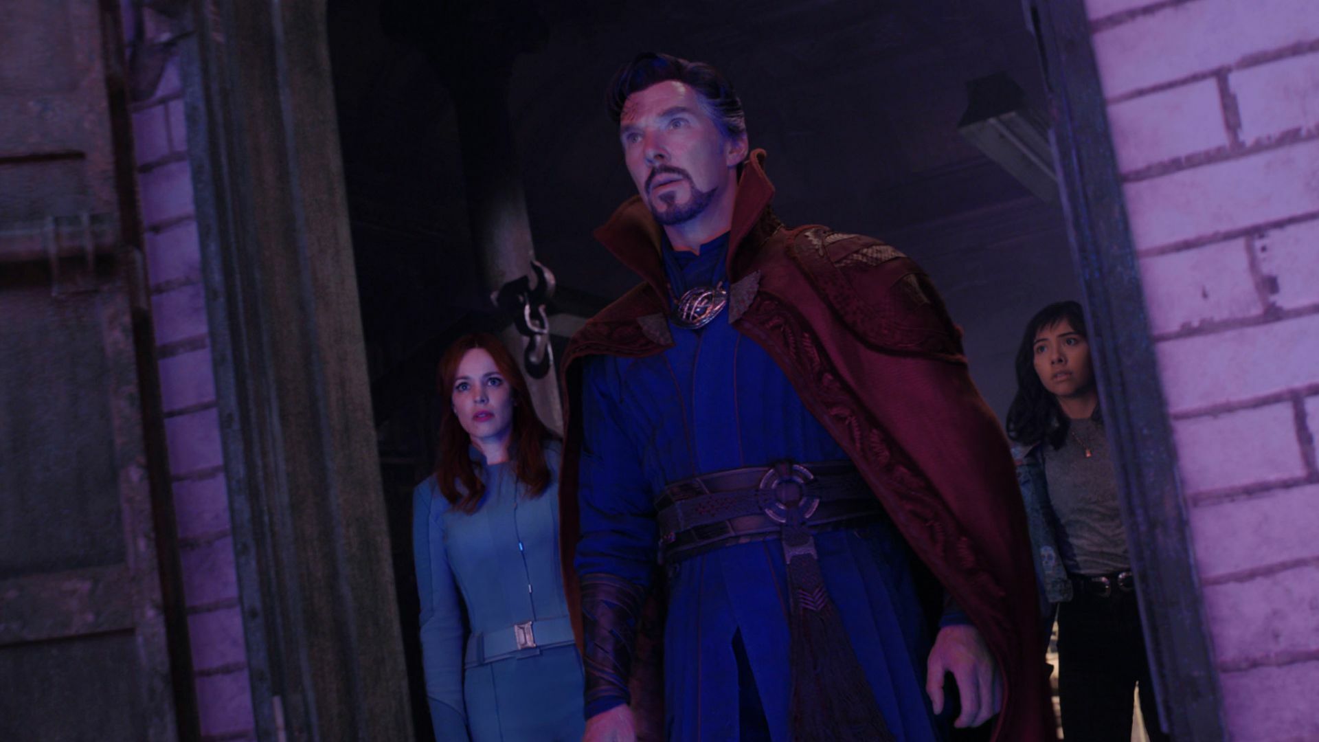 Doctor Strange stands in a doorway