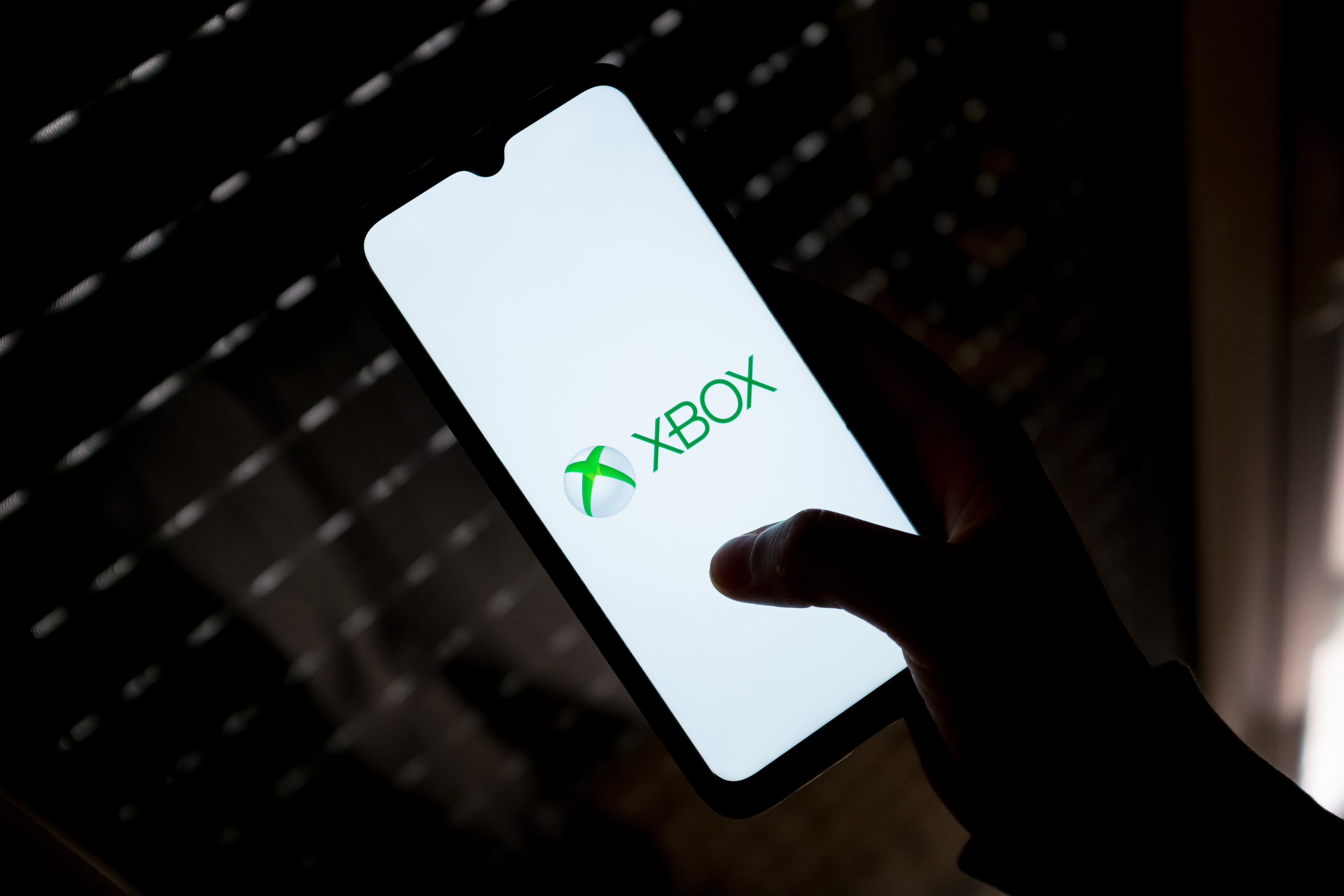 an Xbox logo seen displayed on a smartphone screen